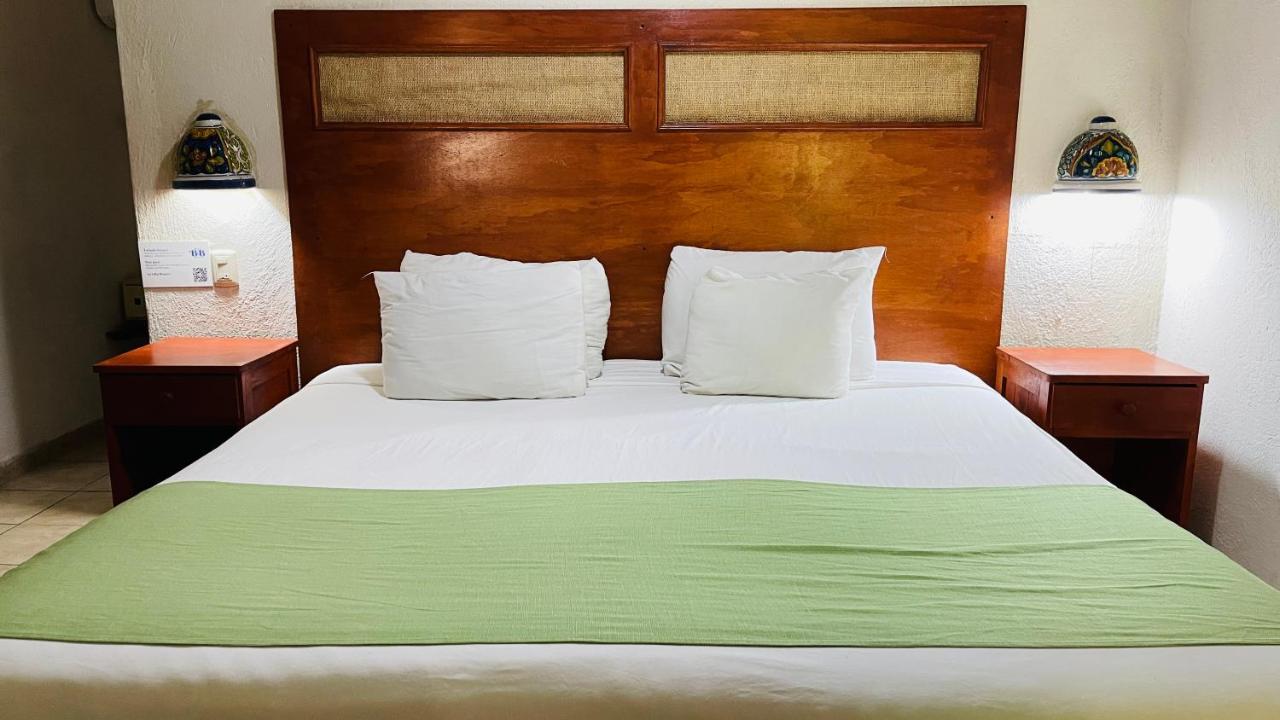 Hotel B&B - 5Th Avenue Playa del Carmen Luaran gambar A bed with a green bedsheet